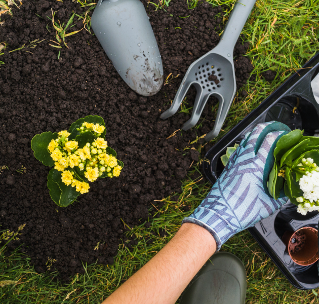 A woman operating a heavy duty leaf blower<br />